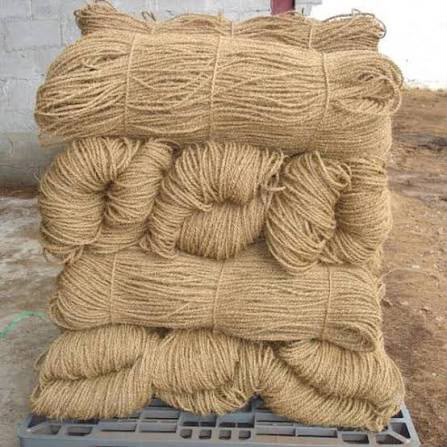 Hanks of coir rope stacked on a pallet